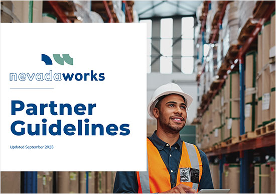 An image of a man in a construction hat smiling with Partner Guidelines next to him