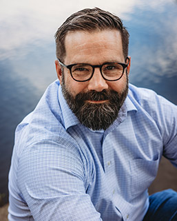 headshot of Caleb Cage