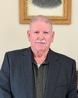 headshot of Chuck Sayles